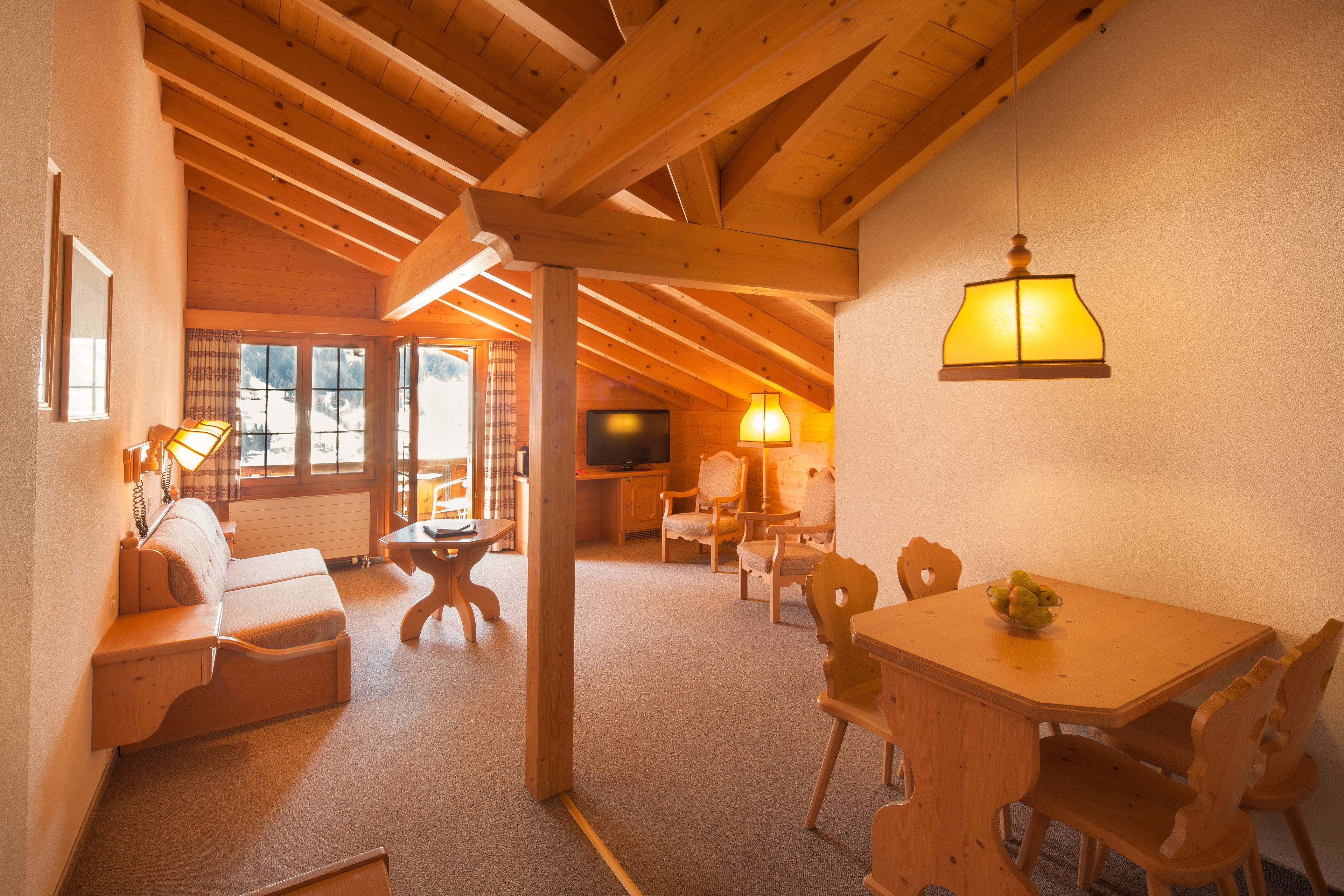 superior suite, 1 bedroom, mountain view | living area | flat-screen tv