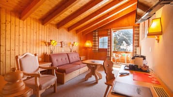 Superior Twin Room, Balcony, Mountain View | Living area | Flat-screen TV