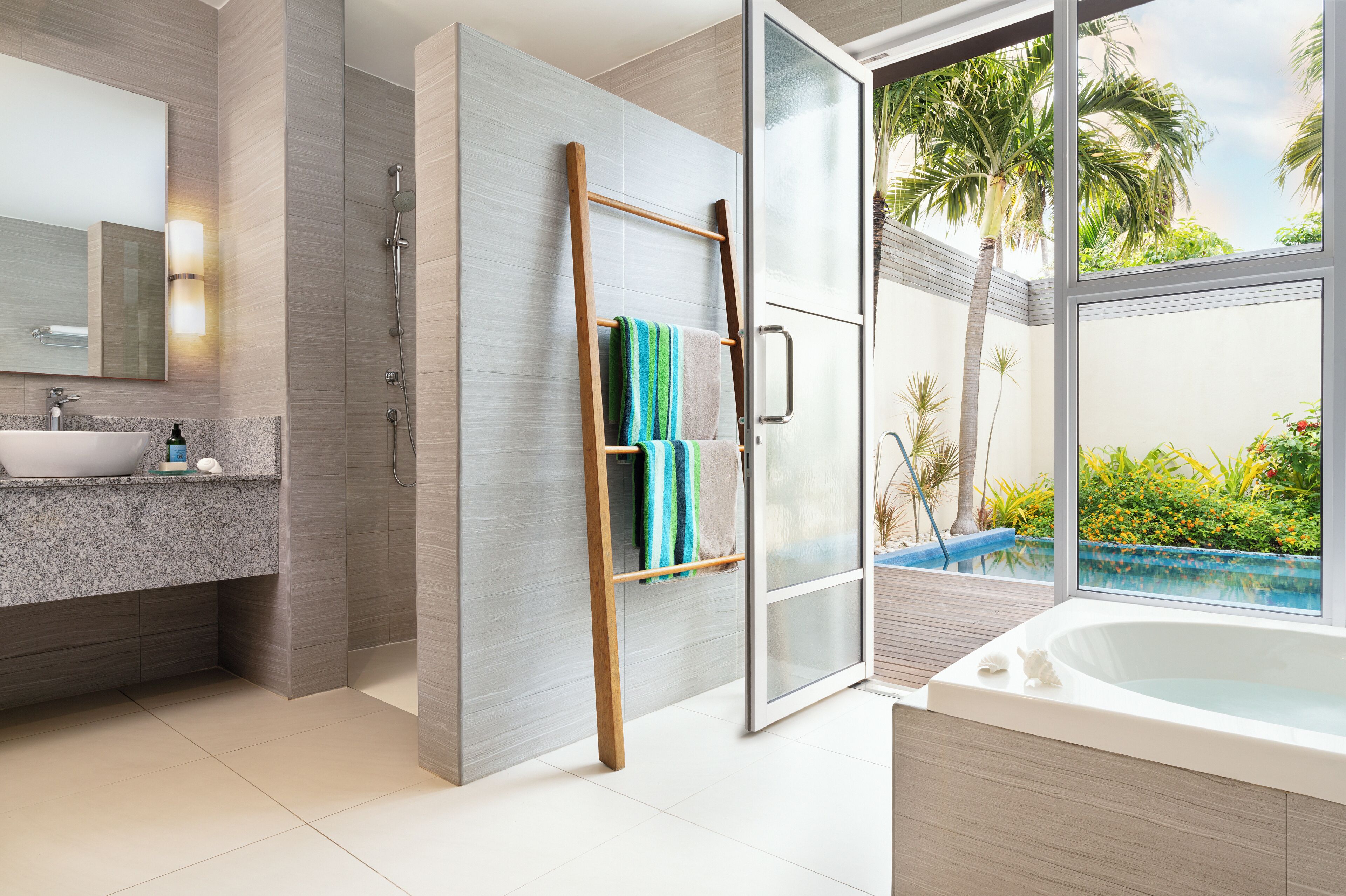 garden pool villa | bathroom | separate bathtub and shower, rainfall showerhead, free toiletries