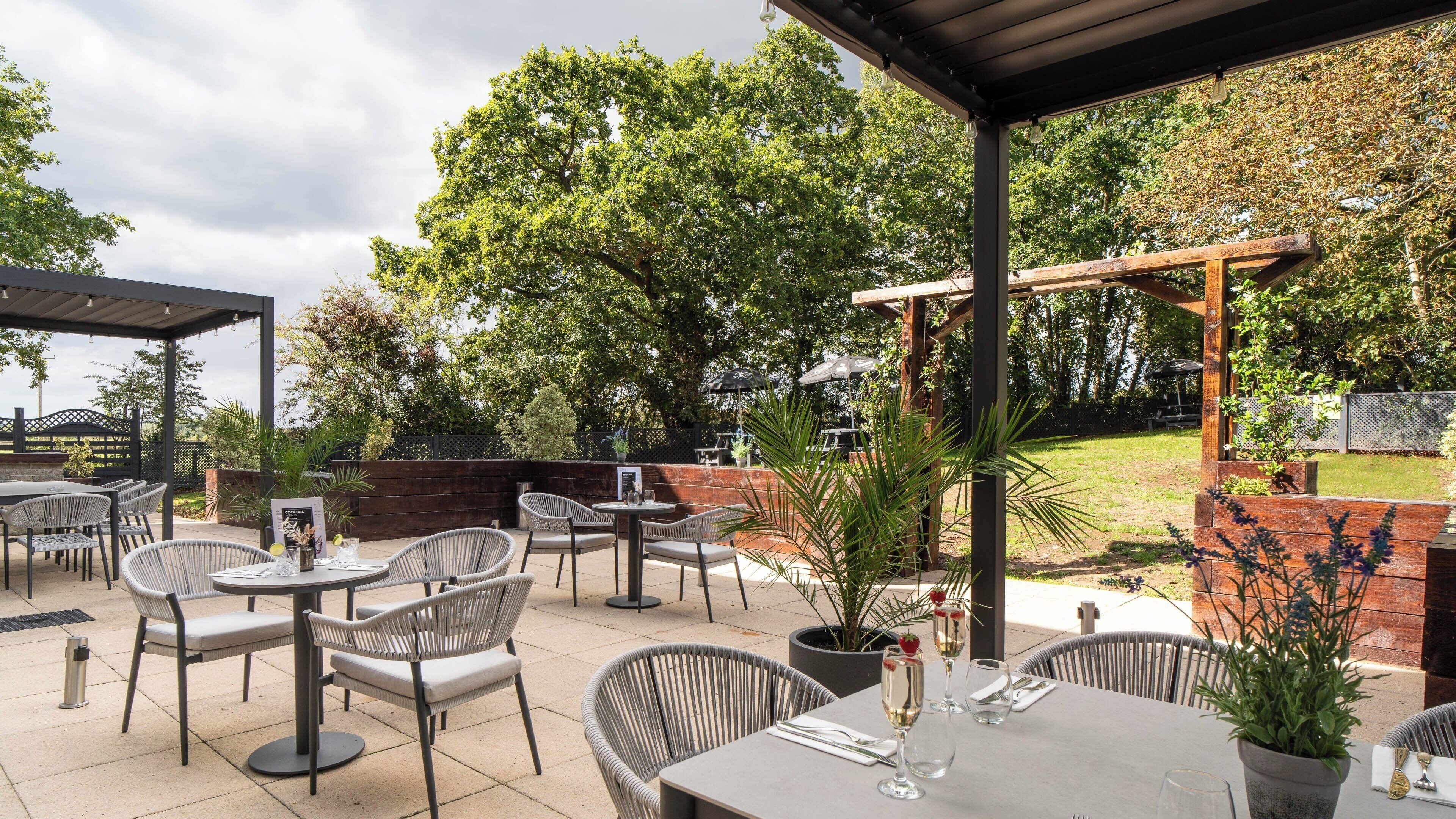 Breakfast, lunch, dinner served; garden views