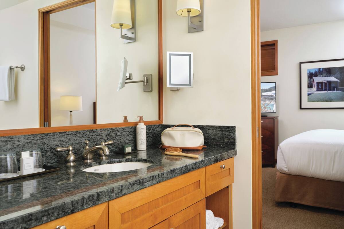 separate bathtub and shower, deep-soaking bathtub, designer toiletries