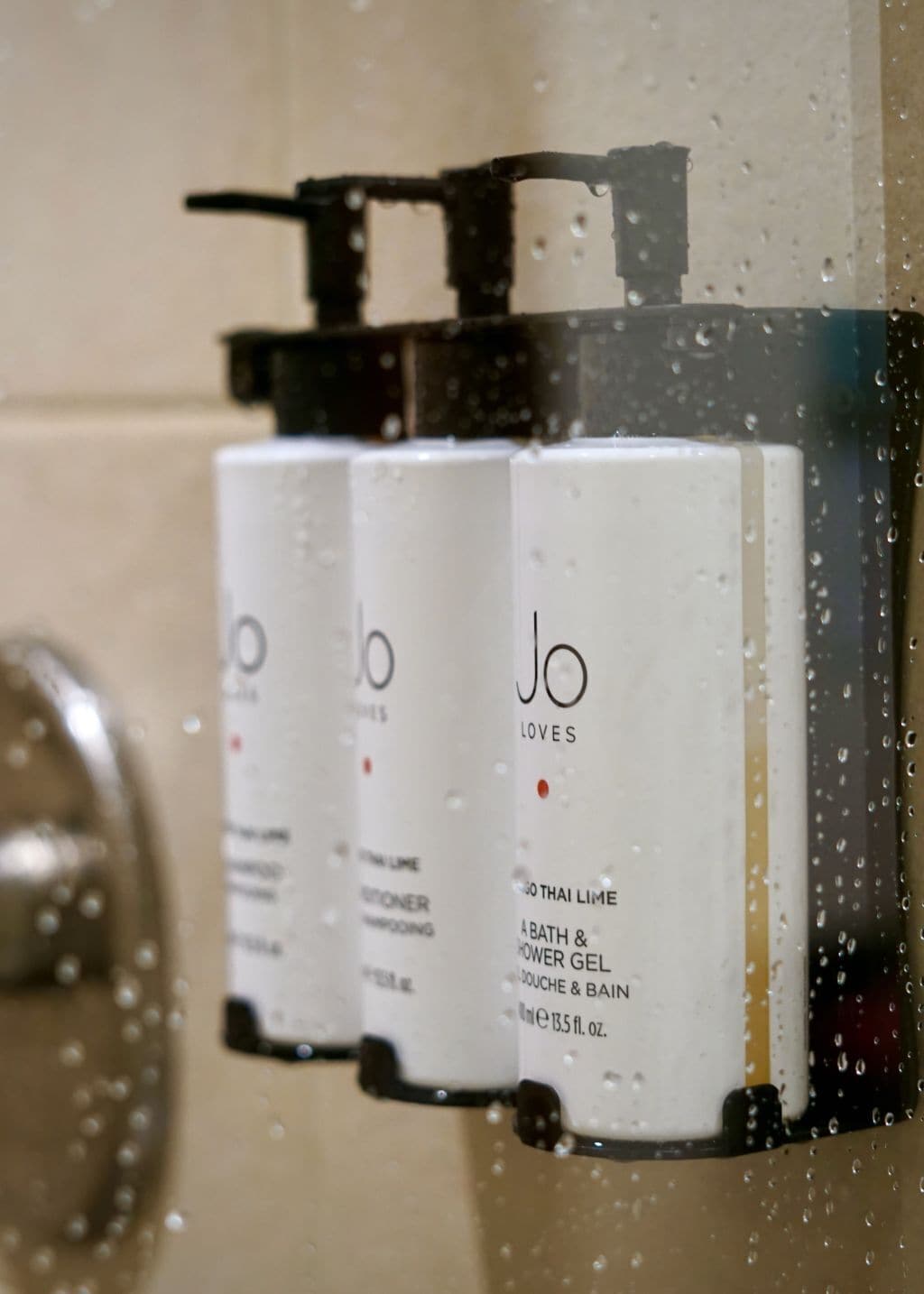 separate bathtub and shower, deep-soaking bathtub, designer toiletries