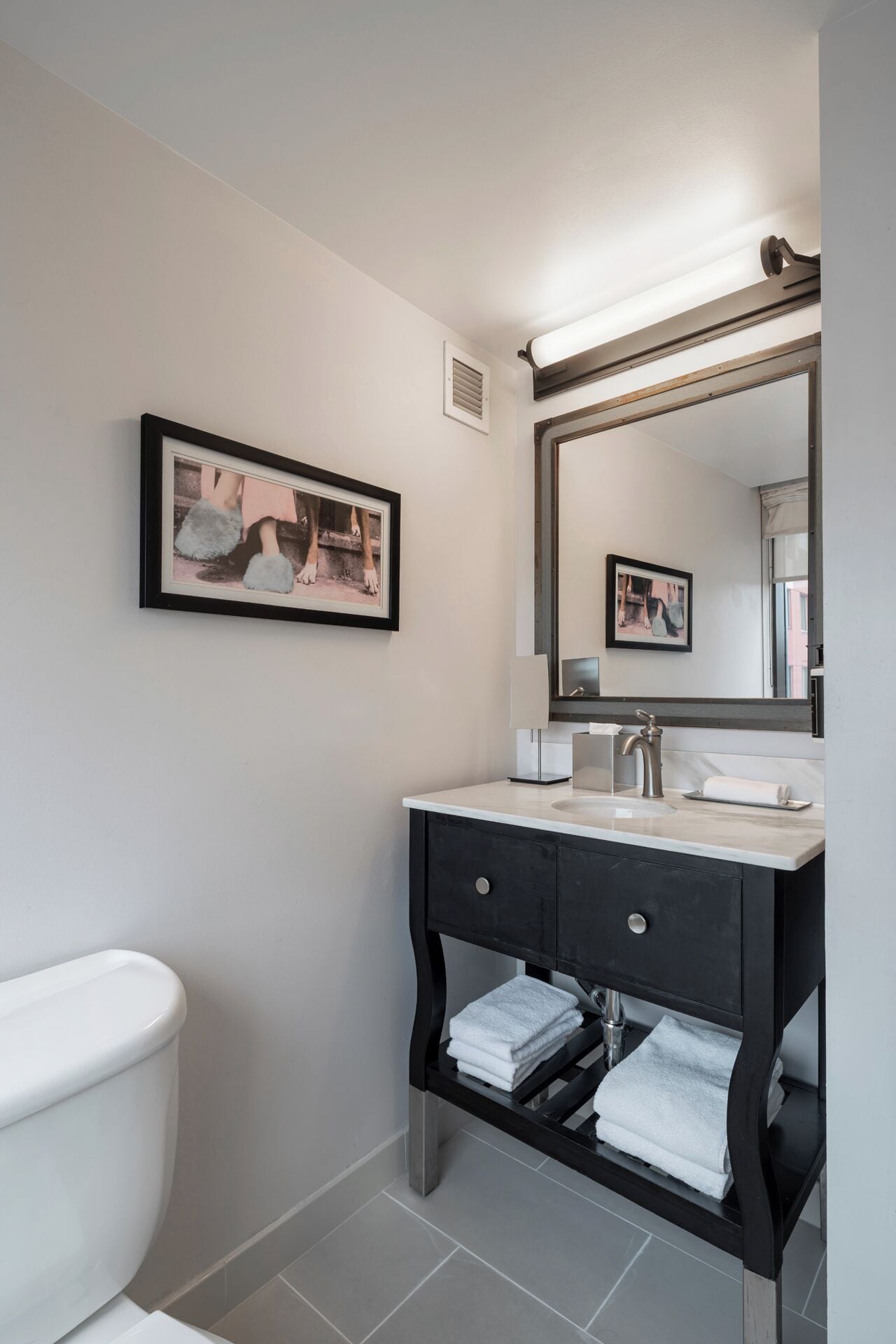 designer toiletries, hair dryer, bathrobes, slippers