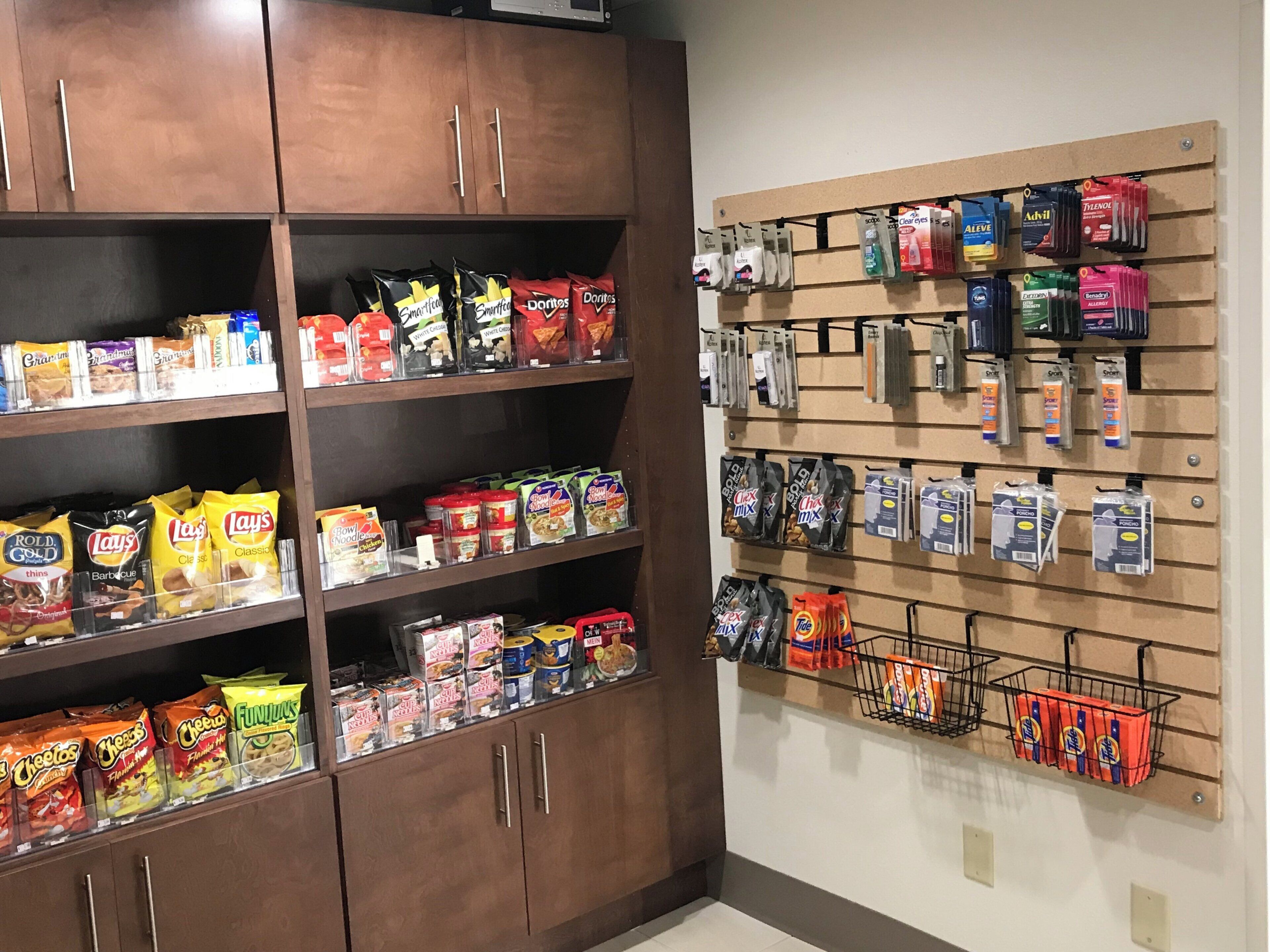 A snack aisle with various chips and snacks.