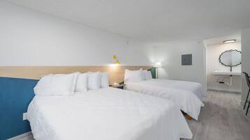 Chambre, 2 grands lits | 1 chambre, Wi-Fi gratuit, draps fournis