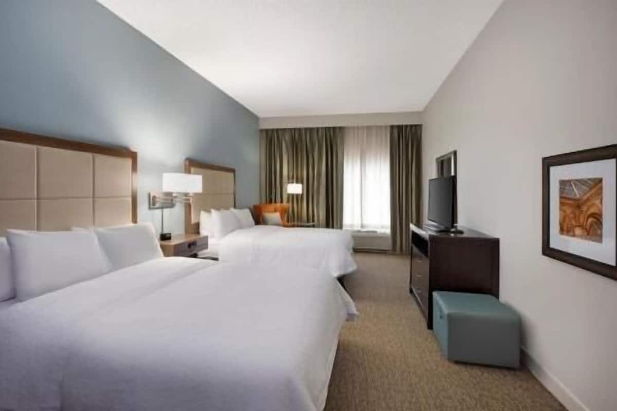 Premium bedding, blackout curtains, iron/ironing board, free WiFi