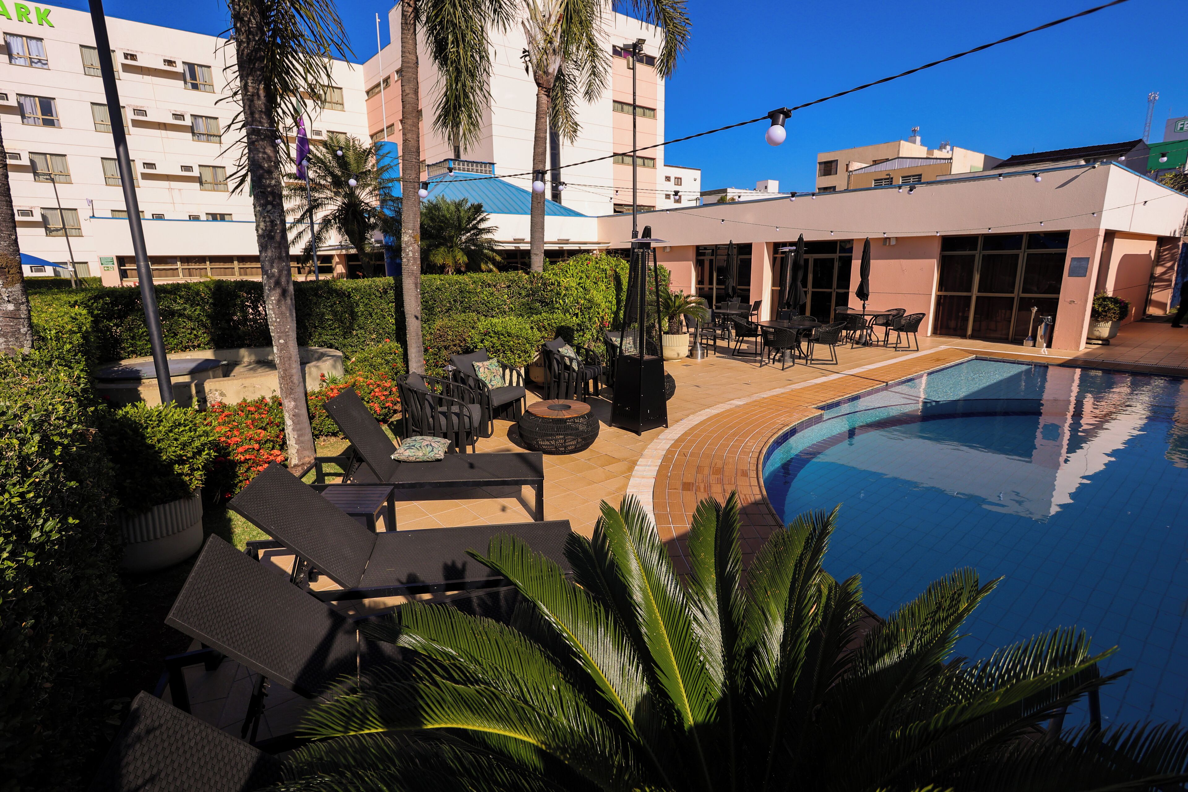 outdoor pool, pool umbrellas, pool loungers