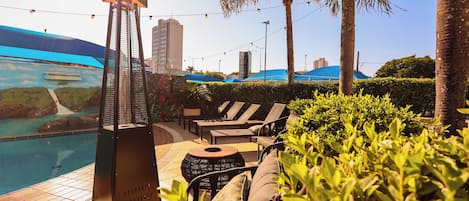 Outdoor pool, pool umbrellas, sun loungers