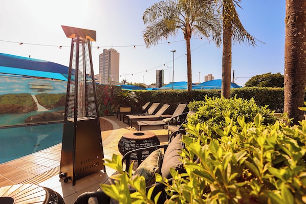 Outdoor pool, pool umbrellas, pool loungers
