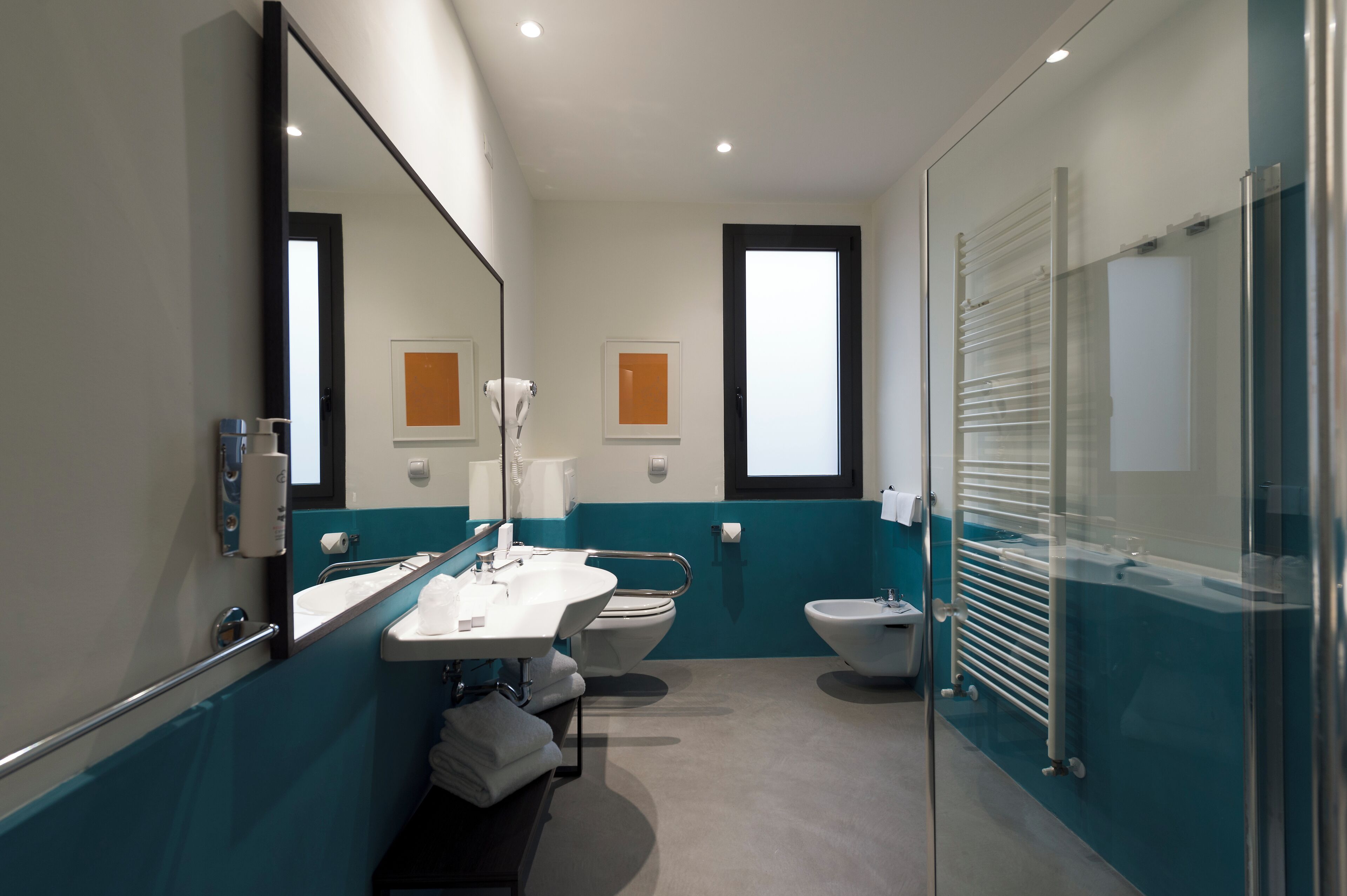 deluxe room | bathroom | shower, free toiletries, hair dryer, slippers