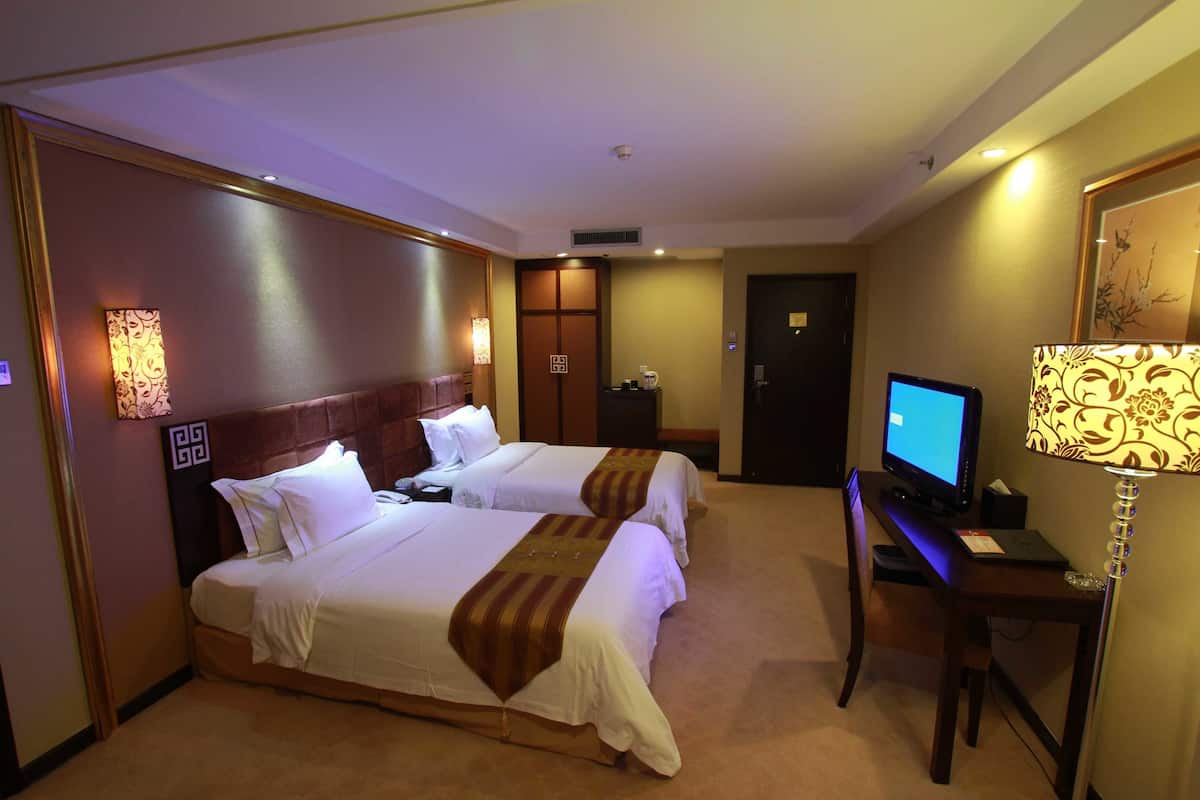 Chambre Affaires, 2 lits jumeaux | Coffre-fort, accès au Wi-Fi (inclus), literie fournie