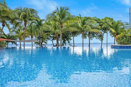 2 outdoor pools, open 5:00 AM to 10:00 PM, pool umbrellas, pool loungers