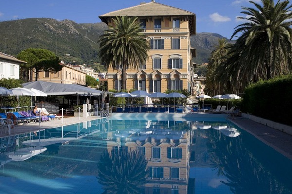 Seasonal outdoor pool, open 9:00 AM to 7:00 PM, pool umbrellas