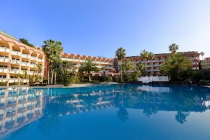 2 outdoor pools, pool umbrellas, pool loungers