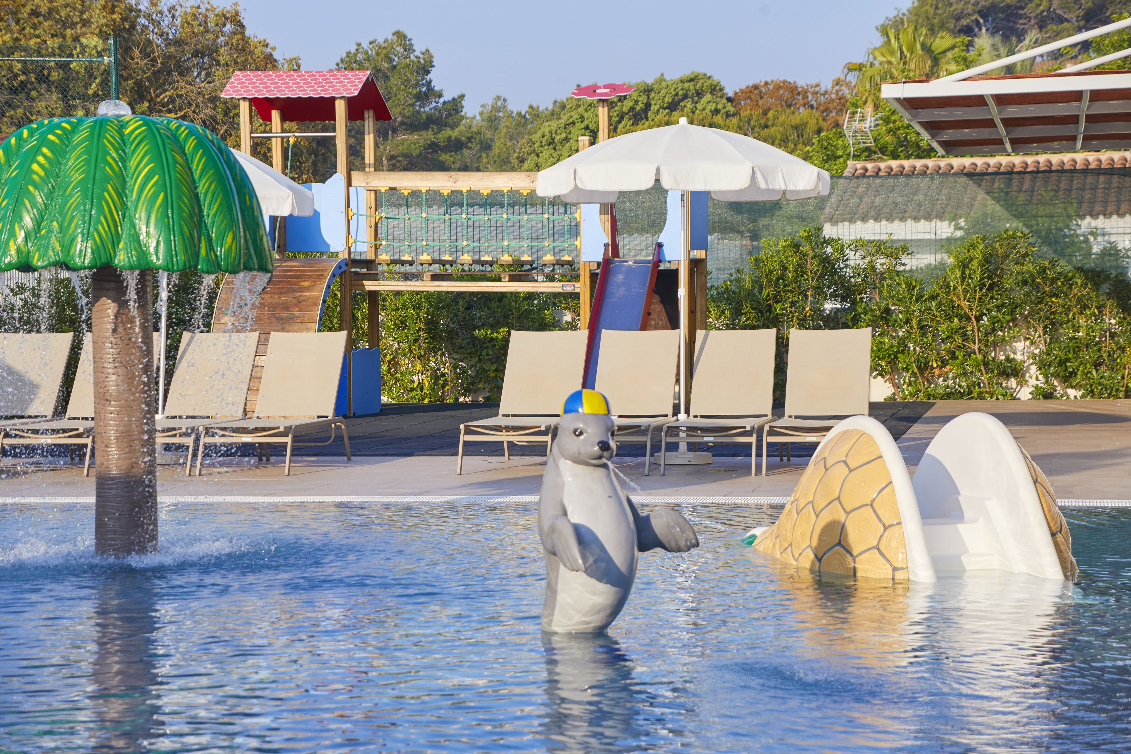 Indoor pool, 2 outdoor pools, open 10 AM to 6:30 PM, pool umbrellas