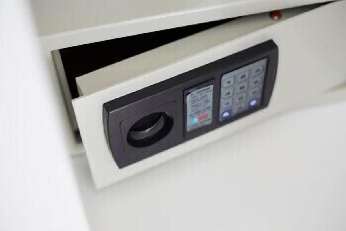 A control panel with a circular dial and several buttons, likely for adjusting settings.