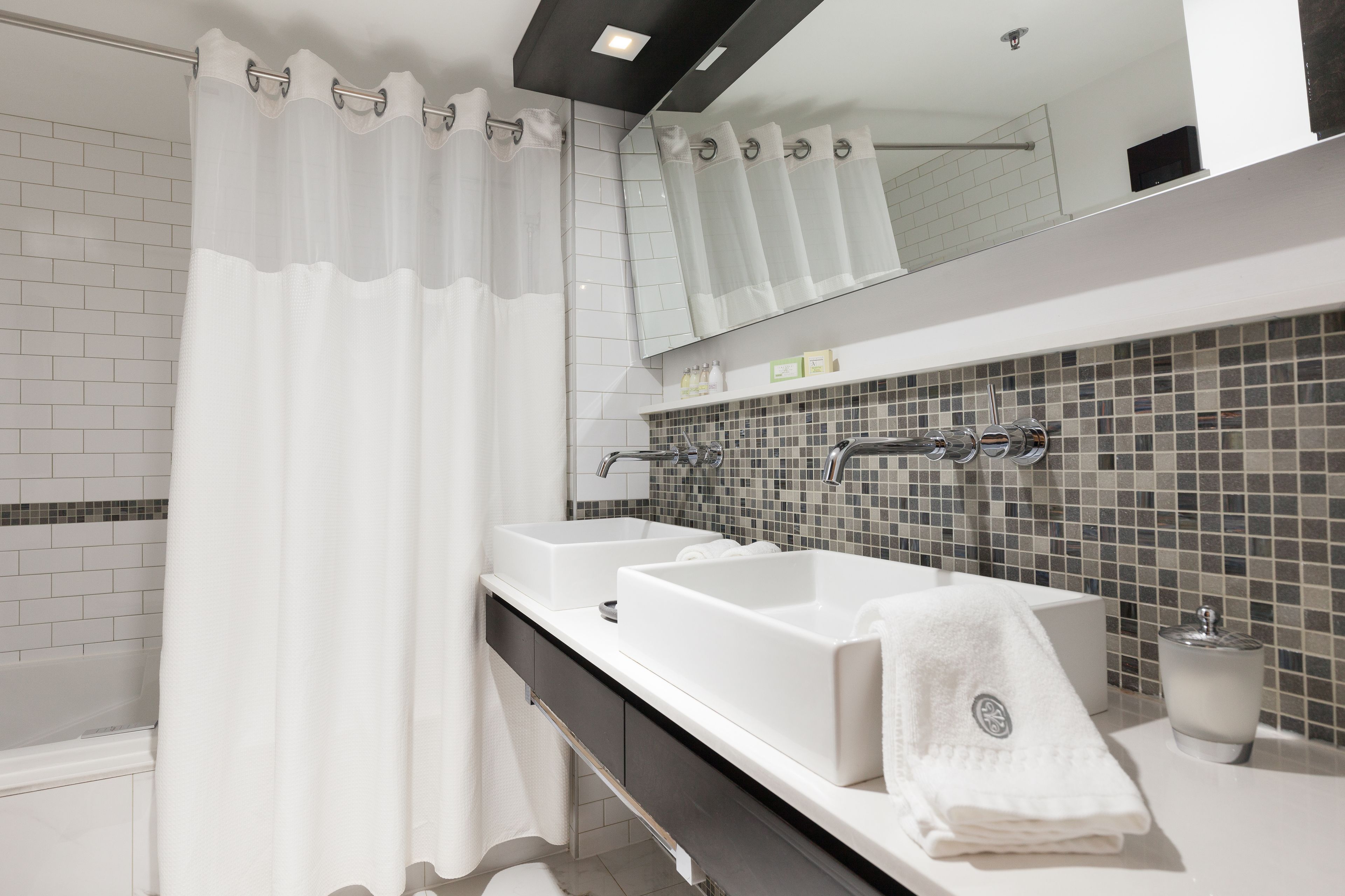 suite with 2 double beds | bathroom | free toiletries, hair dryer, bathrobes, towels