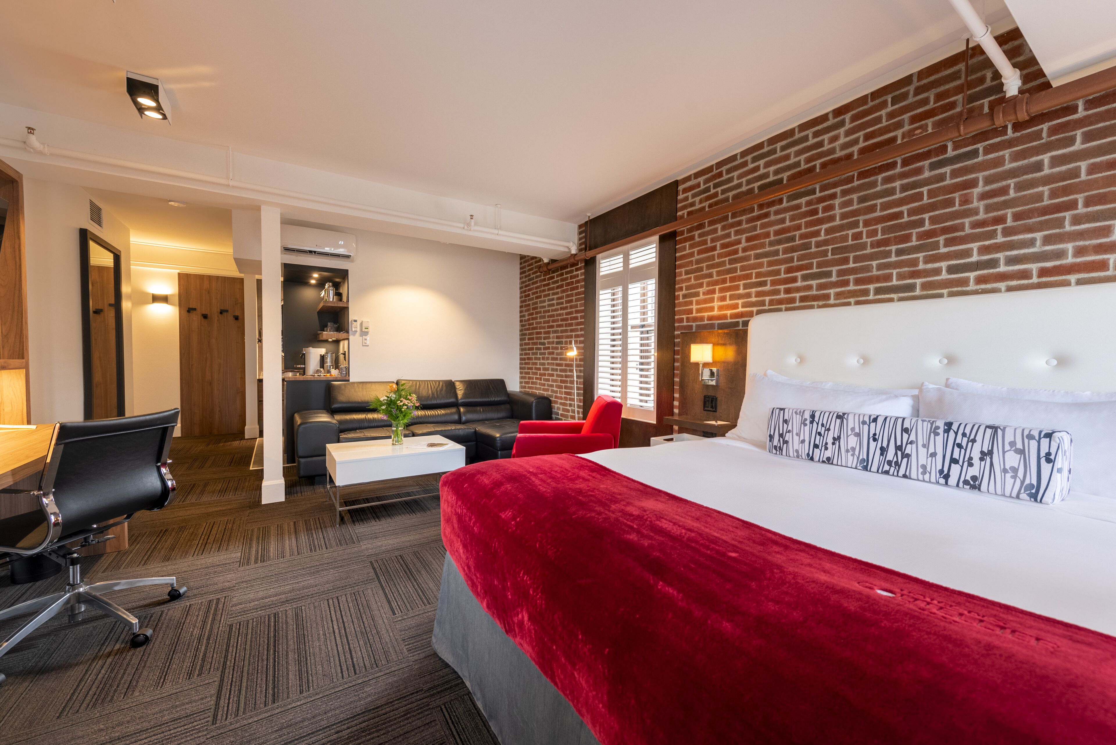 Premium bedding, down comforters, pillowtop beds, minibar