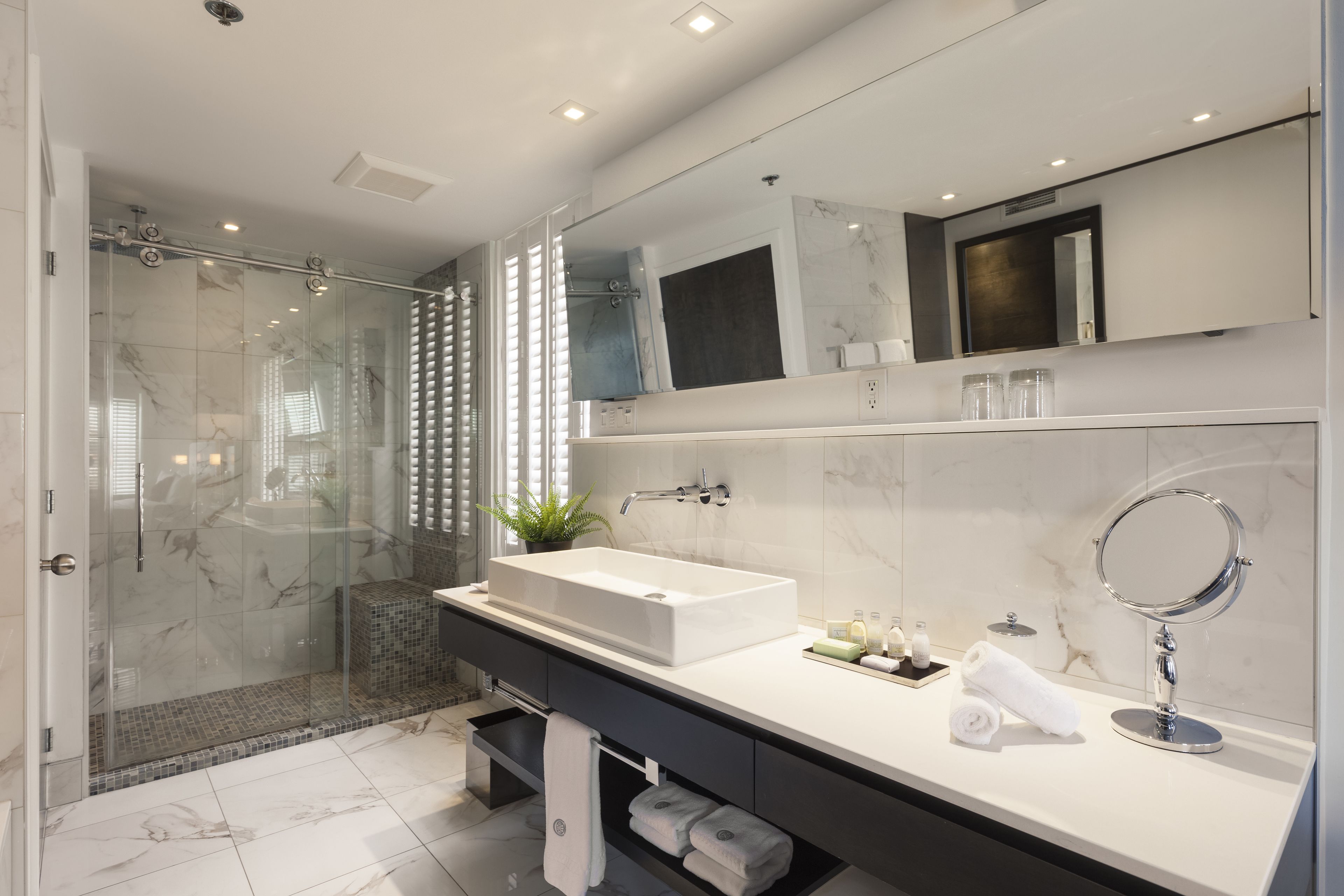 king suite with open bathroom | bathroom | free toiletries, hair dryer, bathrobes, towels