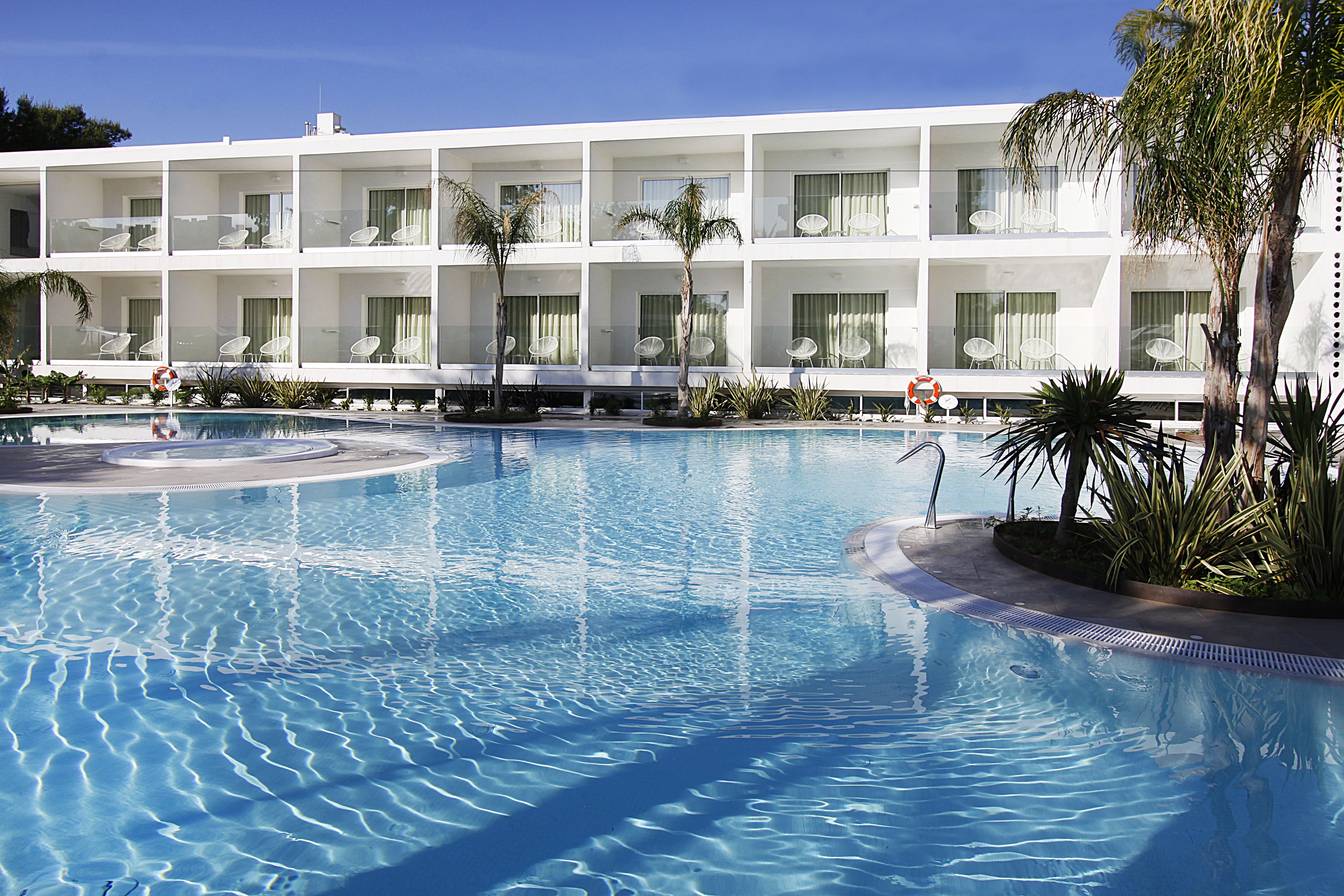 indoor pool, outdoor pool, open 8:00 am to 7:00 pm, pool umbrellas