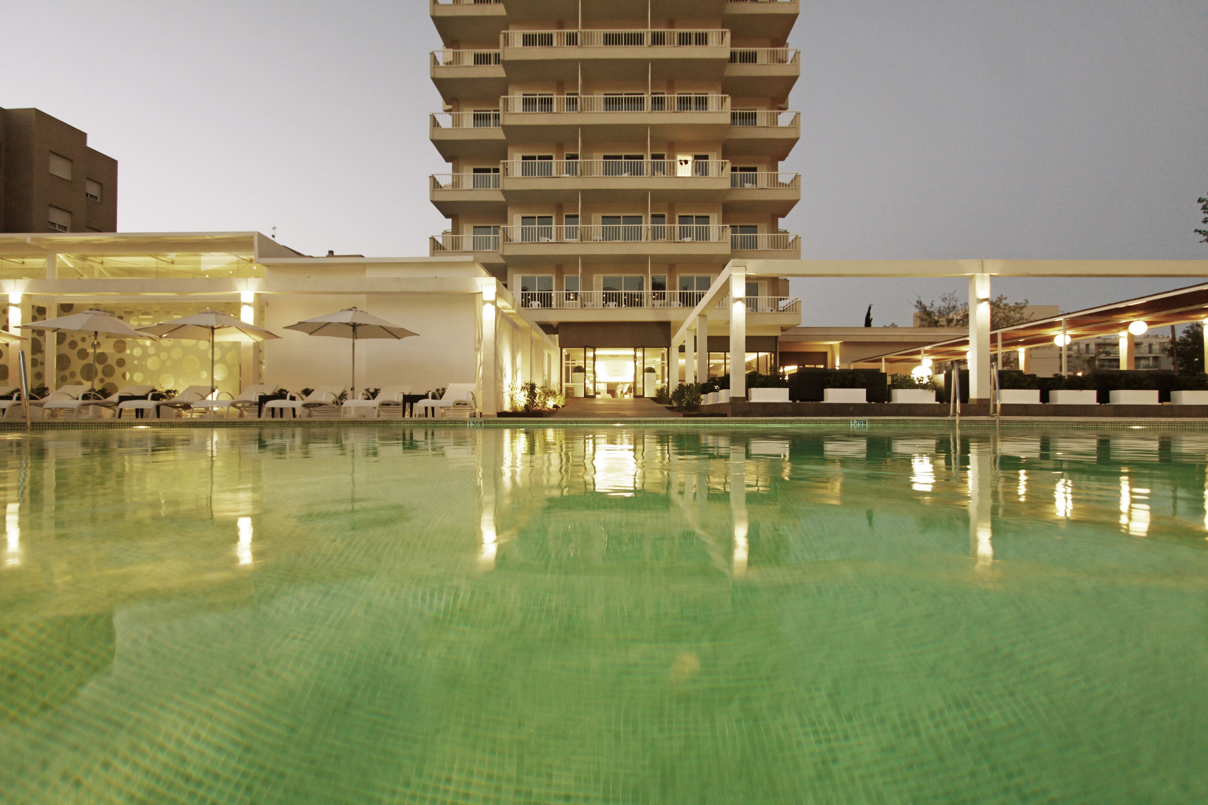 indoor pool, outdoor pool, open 8:00 am to 7:00 pm, pool umbrellas