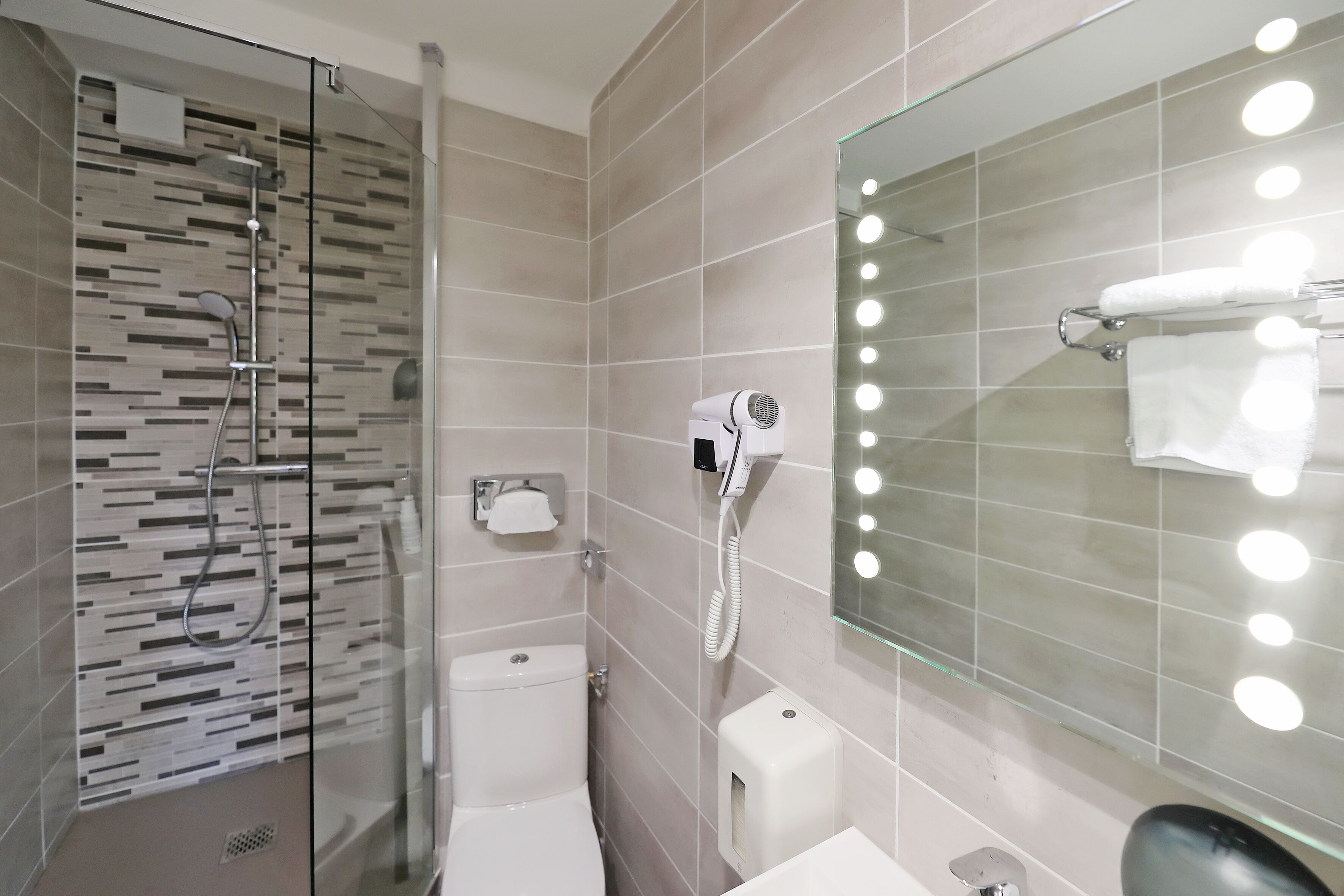 premium double room | bathroom | hair dryer, towels