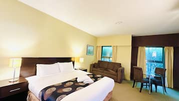 Standard Room, 1 King Bed with Sofa bed, Non Smoking | Desk, iron/ironing board, bed sheets, alarm clocks