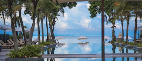 Outdoor pool, open 10:00 AM to 8:00 PM, pool umbrellas, sun loungers