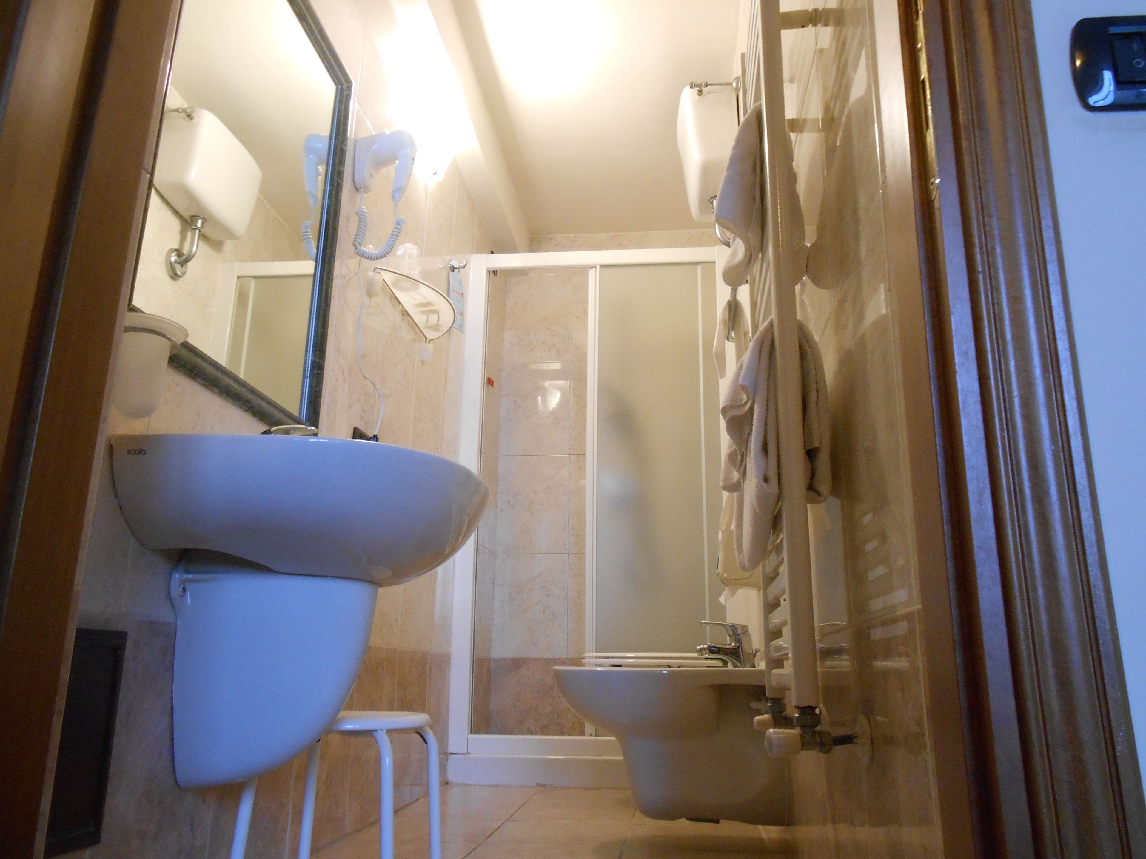 economy double room | bathroom | deep-soaking bathtub, hair dryer, bidet, towels