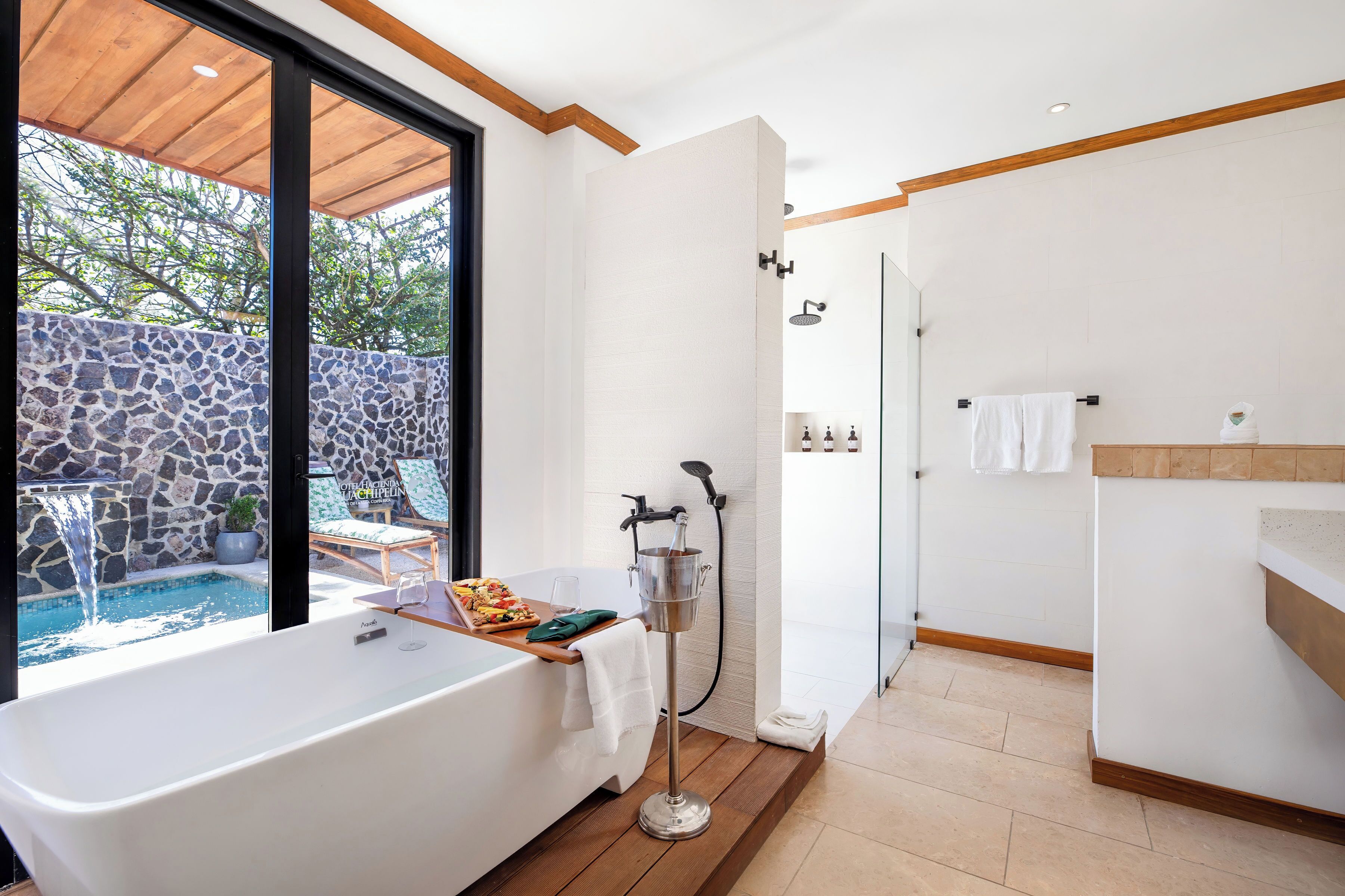 honeymoon suite | bathroom | hair dryer, towels, soap, shampoo