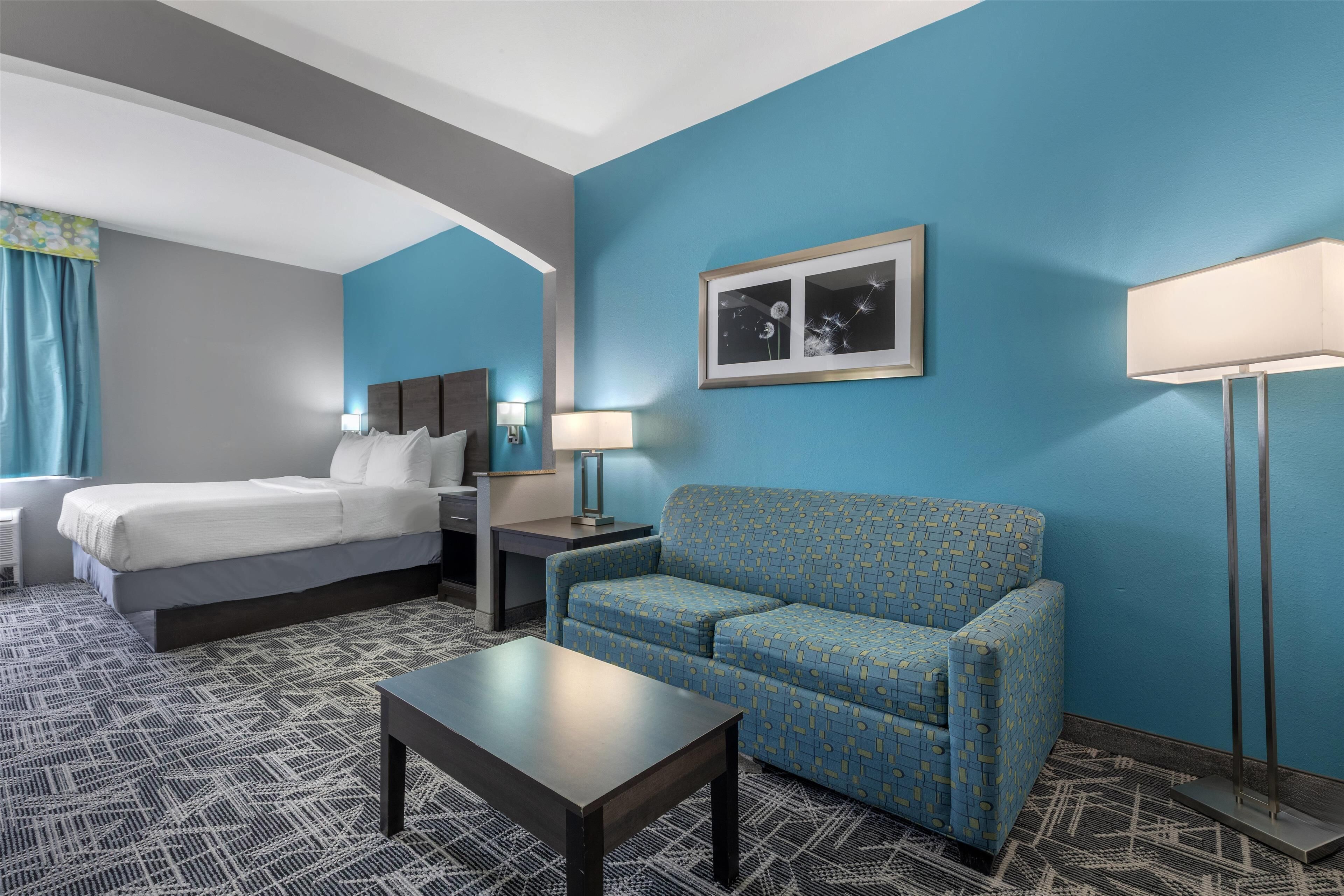 Suite, 1 King Bed, Non Smoking, Microwave (with Sofabed) | In-room safe, iron/ironing board, bed sheets, alarm clocks