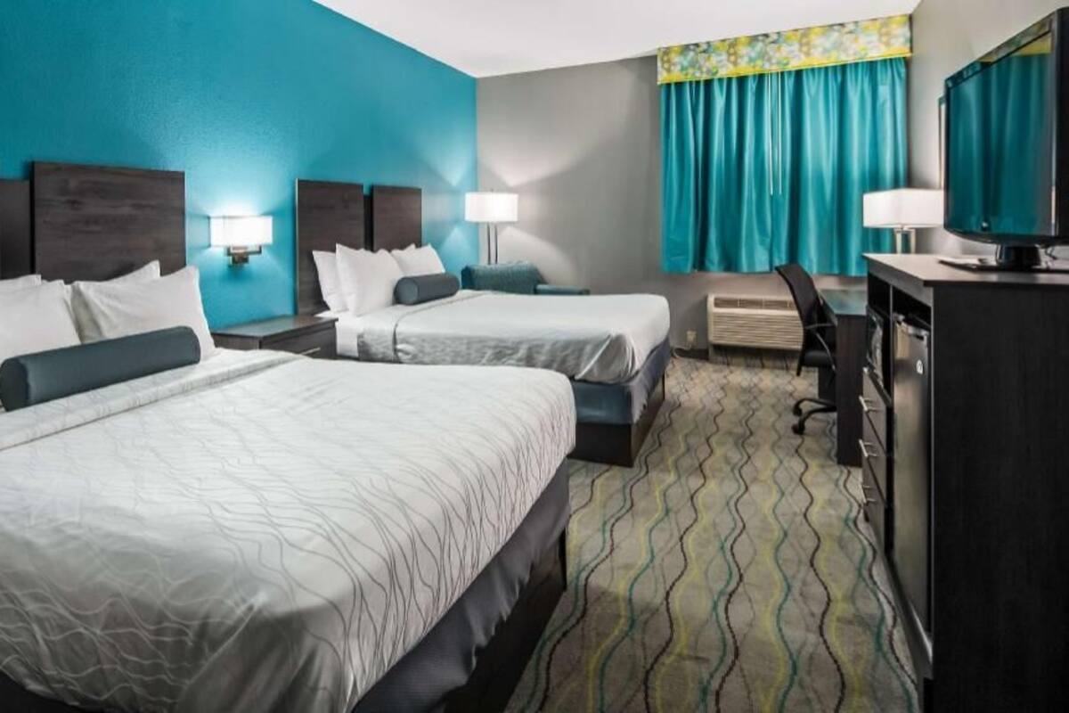 In-room safe, iron/ironing board, bed sheets, alarm clocks