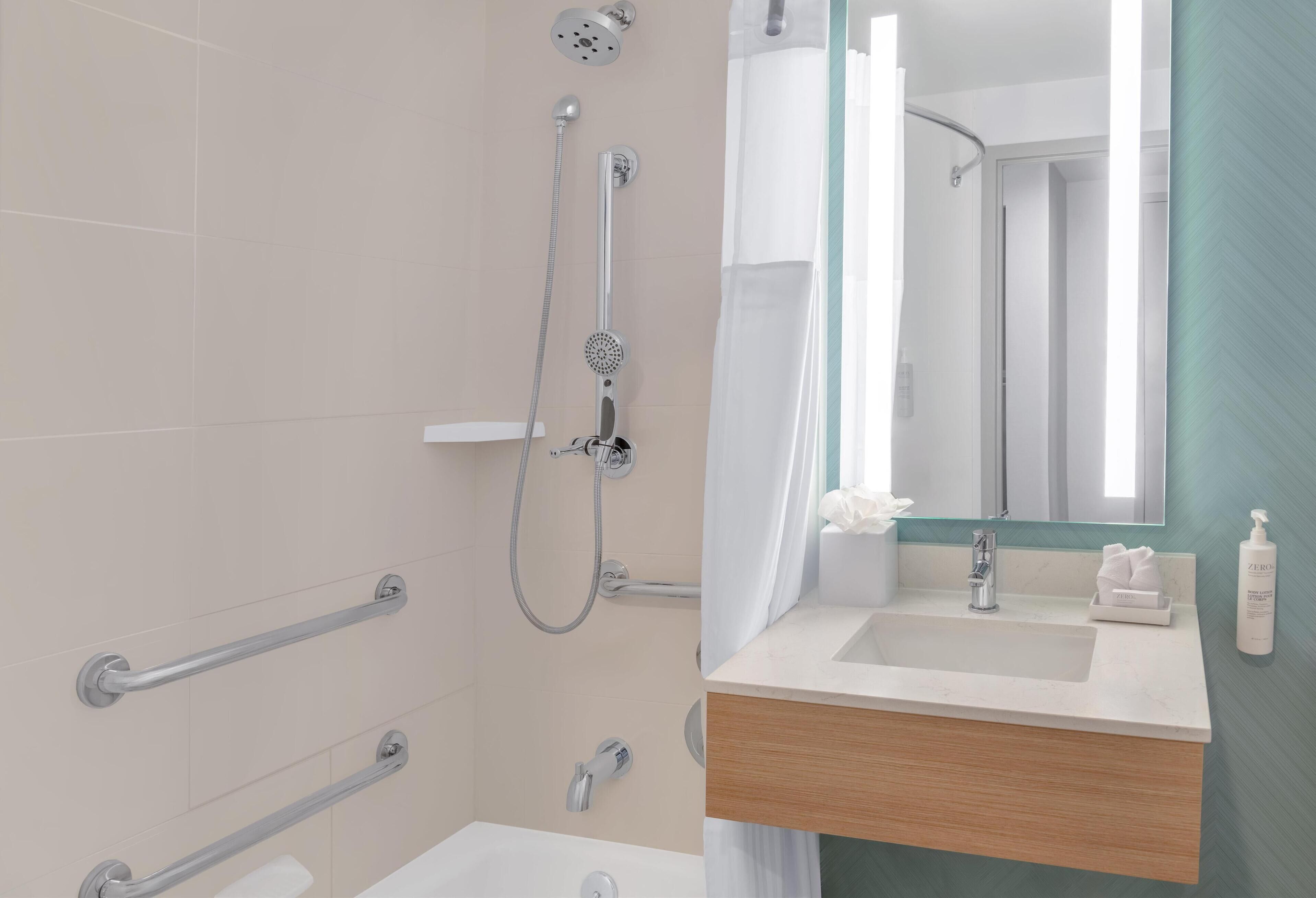 one king bed, accessible | bathroom shower