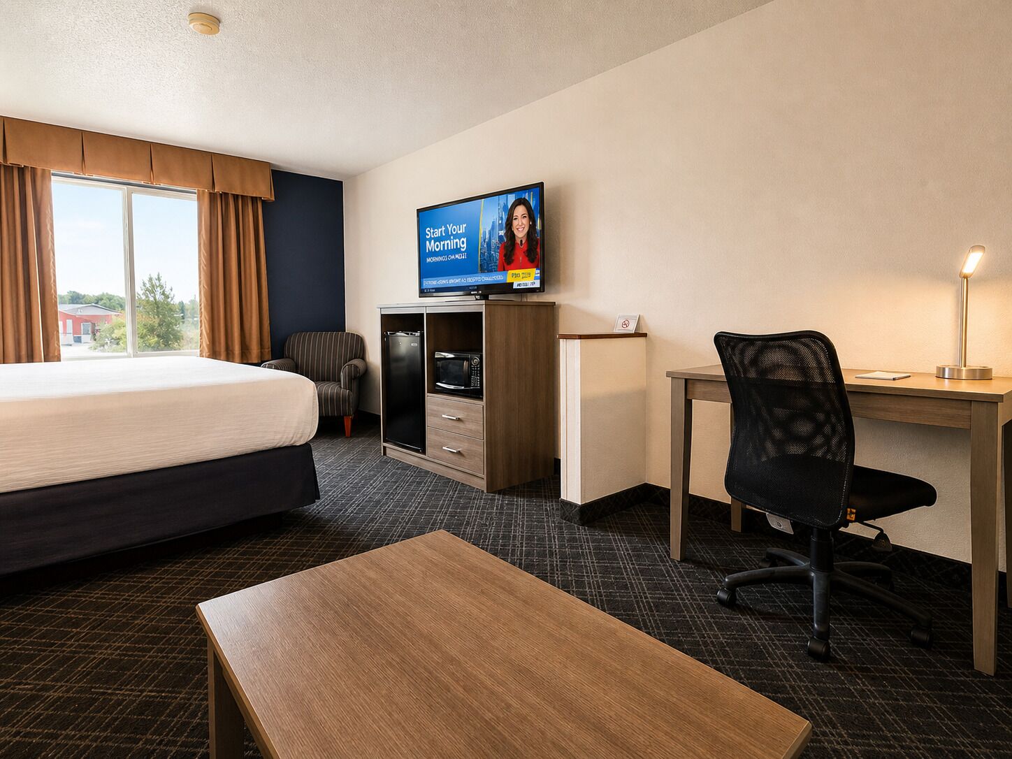 Executive kamer | Woonruimte | Een 32-inch televisie met kabelzenders