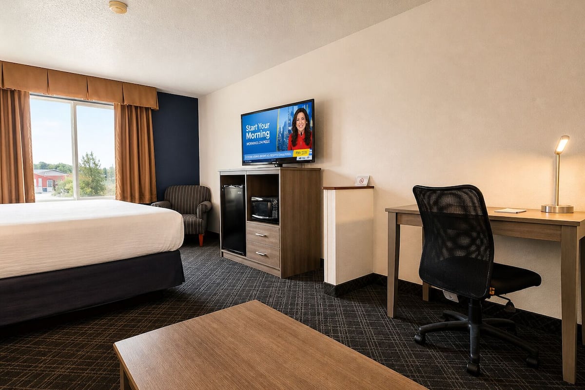 Executive-Zimmer | Wohnbereich | 32-Zoll-Fernseher mit Kabelempfang