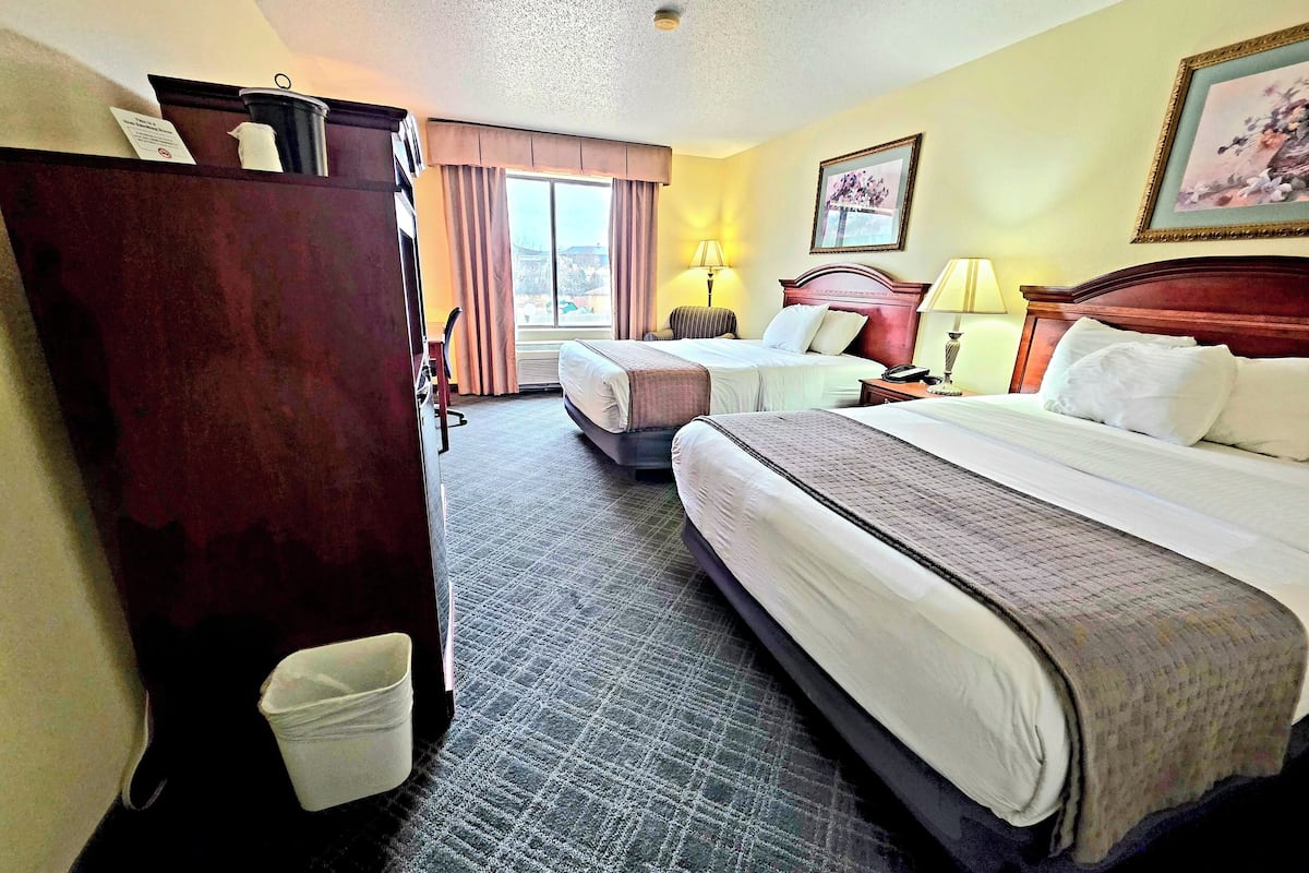 desk, laptop workspace, blackout curtains, iron/ironing board