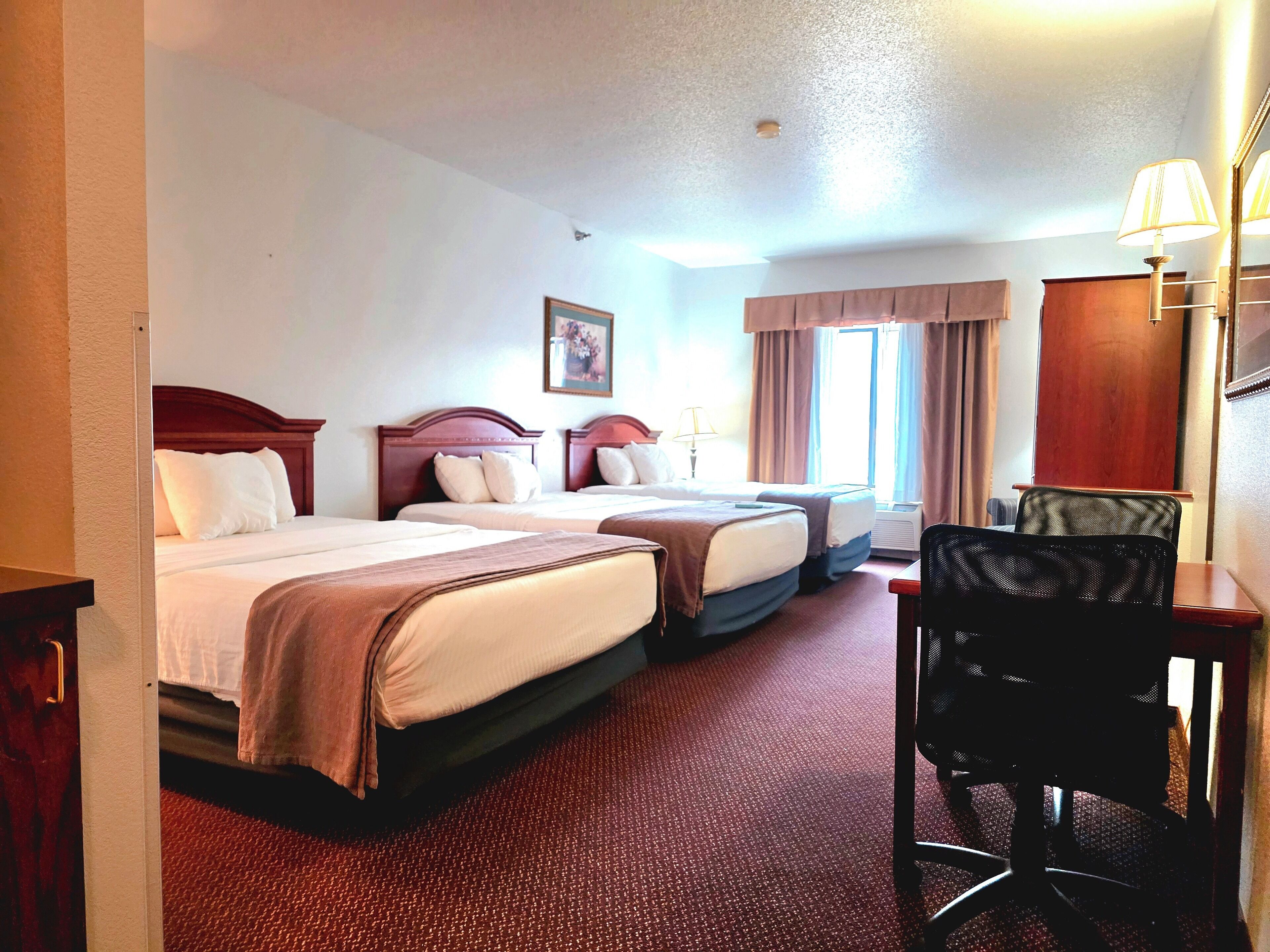 desk, laptop workspace, blackout curtains, iron/ironing board