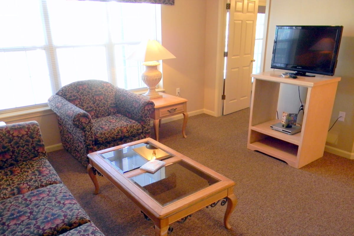 Suite, 1 Queen Bed with Sofa bed | Living room | TV, DVD player