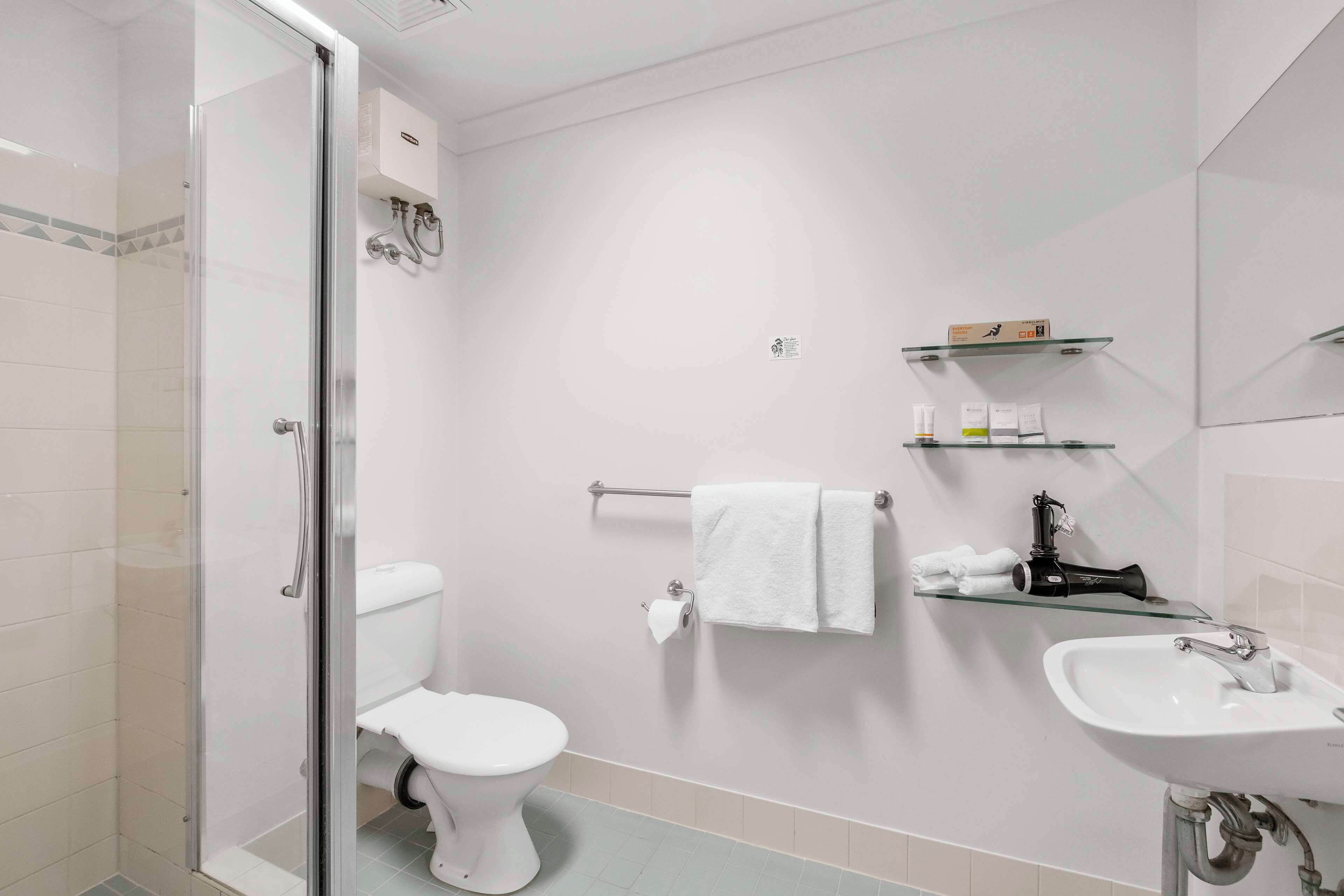 standard family room | bathroom | shower, free toiletries, towels
