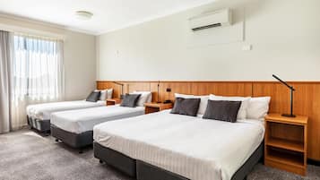 Standard Family Room | Premium bedding, iron/ironing board, free WiFi, bed sheets