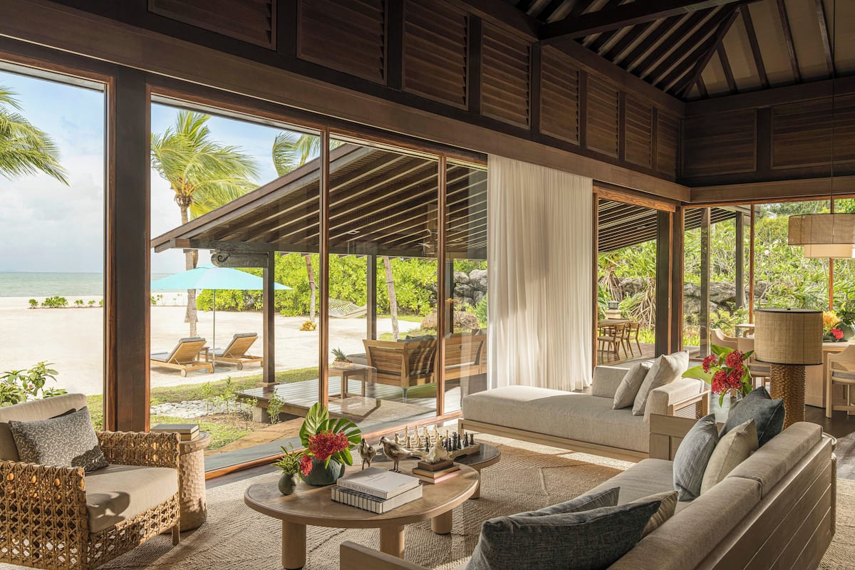 Premier Two-Bedroom Beach Villa with Pool | Living area | 42-inch flat-screen TV with satellite channels, TV, DVD player