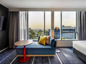 Deluxe Room, 1 Queen Bed | In-room safe, desk, laptop workspace, soundproofing