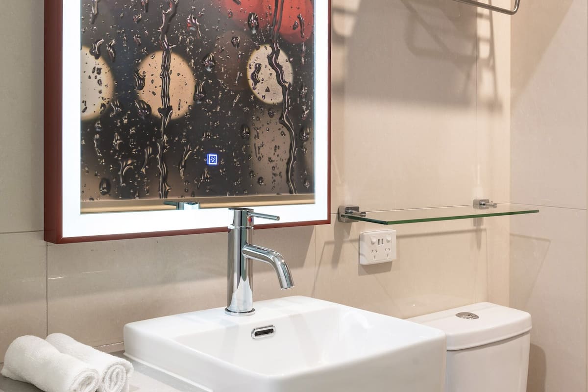 shower, eco-friendly toiletries, hair dryer, towels