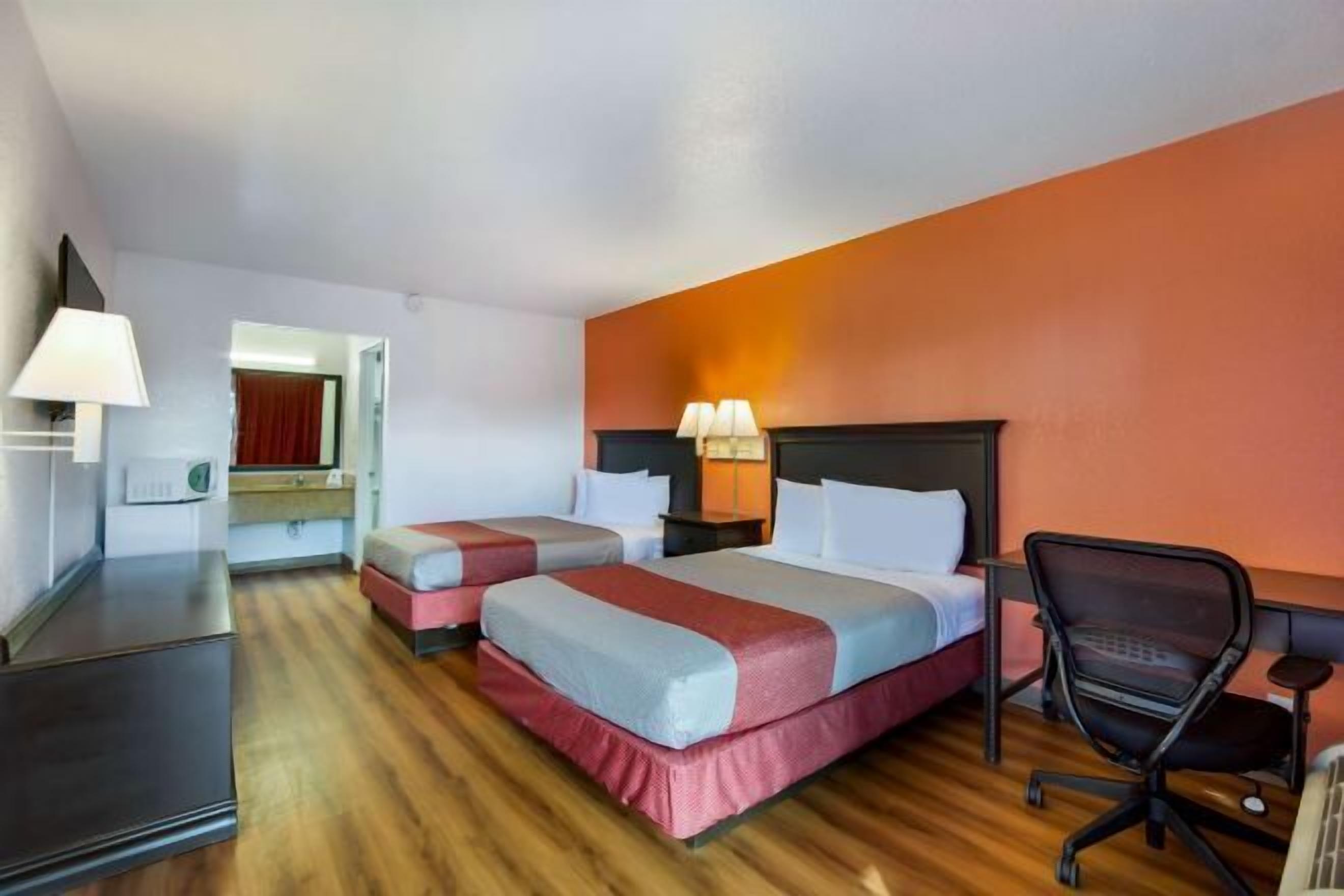 Desk, laptop workspace, blackout curtains, free WiFi