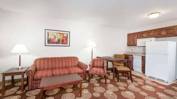 Suite, 1 Queen Bed, Non Smoking | Desk, laptop workspace, iron/ironing board, free WiFi