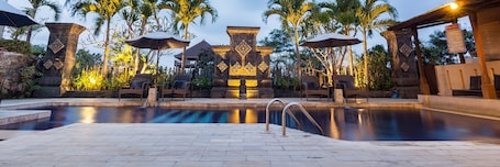 Outdoor pool, open 9:00 AM to 9:00 PM, free cabanas, pool umbrellas