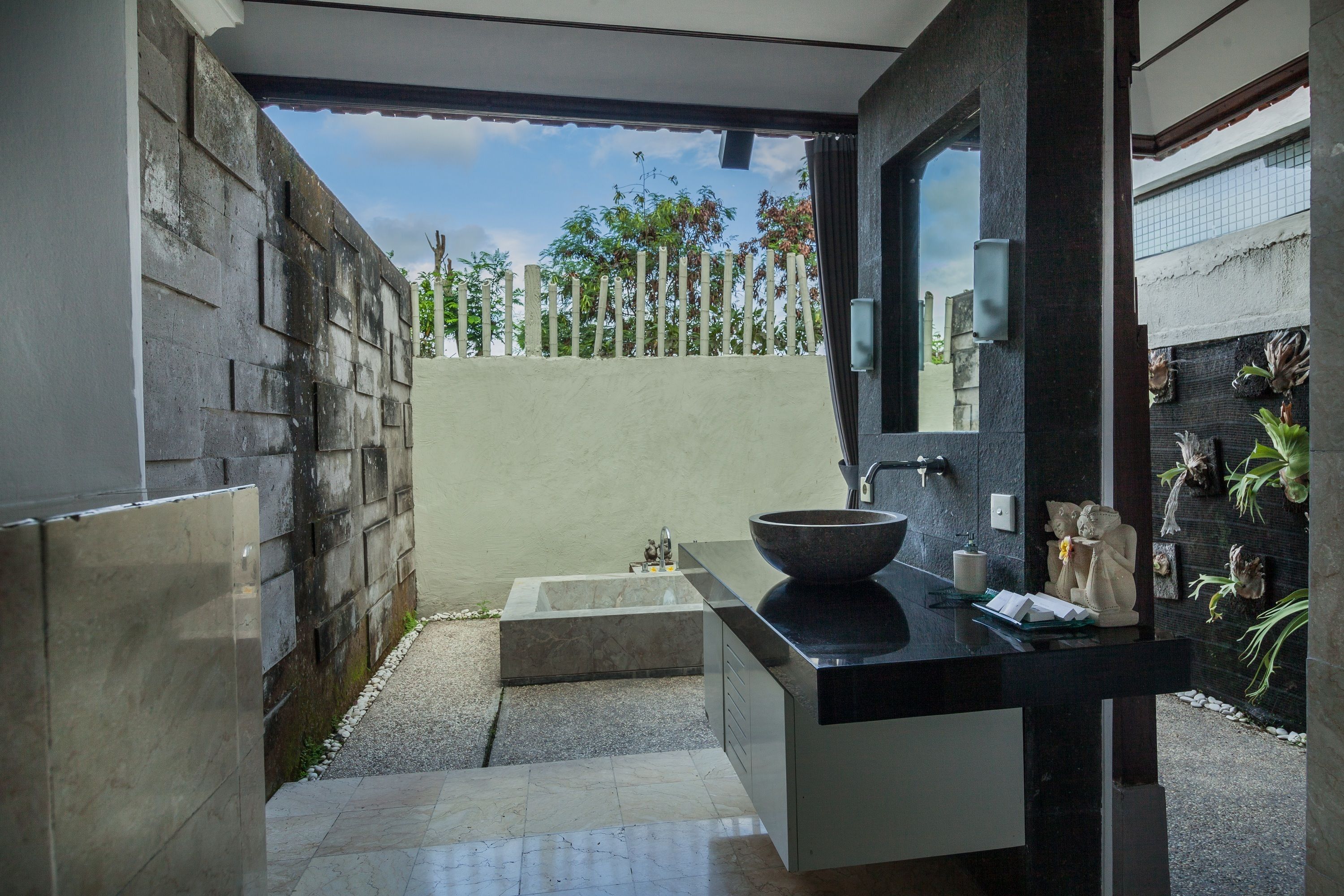 suite room queen bed with garden view | bathroom | free toiletries, hair dryer, towels