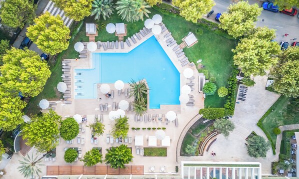 Indoor pool, 4 outdoor pools, open 8:00 AM to 8:00 PM, pool loungers
