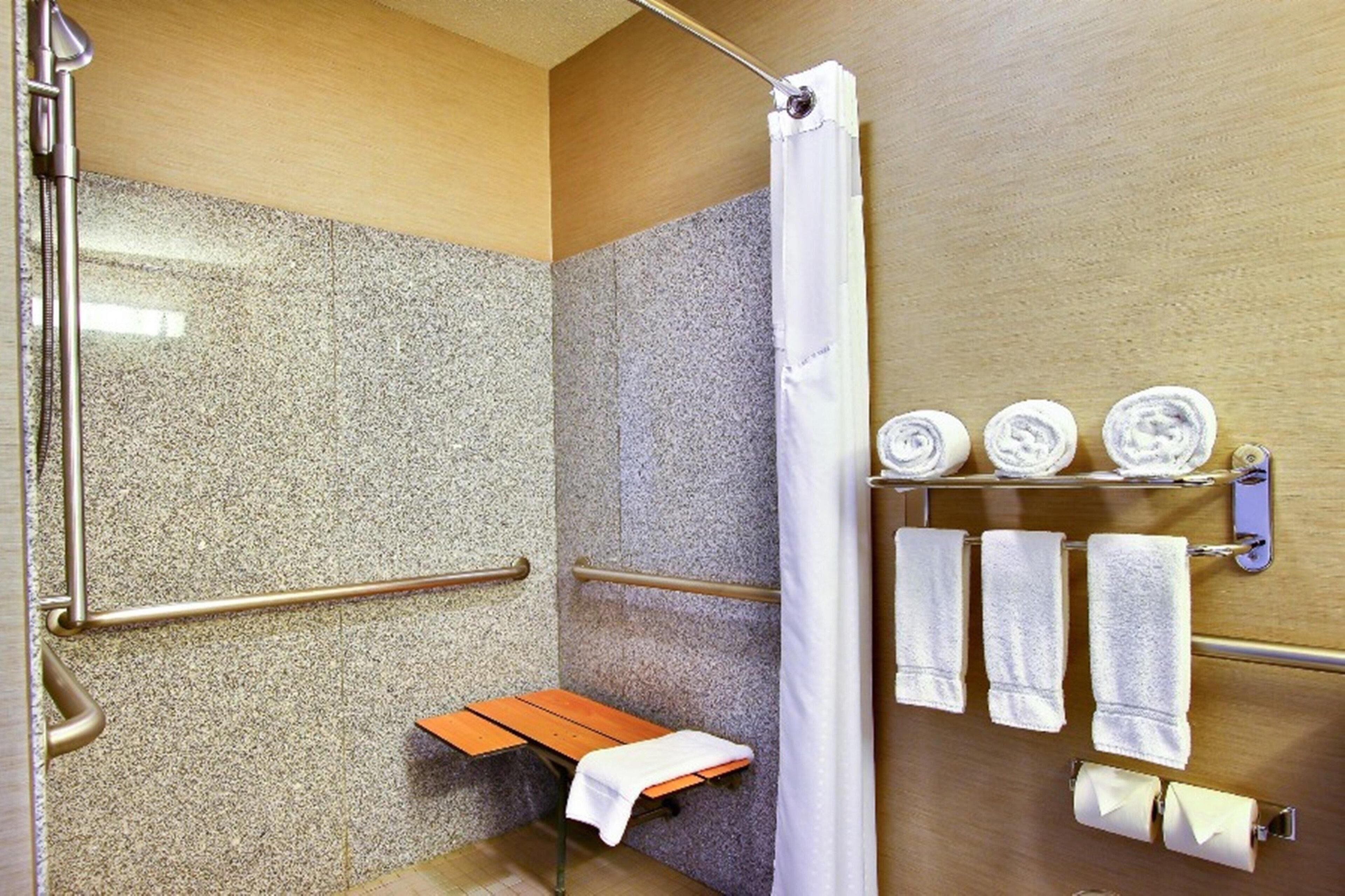 suite, 1 king bed, non smoking | bathroom | free toiletries, hair dryer, towels, soap