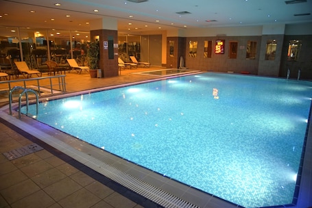 Indoor pool, open 10:00 AM to 9:00 PM, sun loungers, lifeguards on site